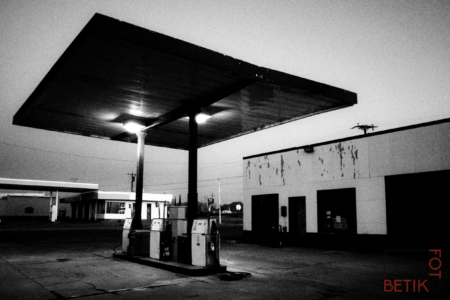 This photo was taken an hour later than <a href="https://www.flickr.com/photos/wrherndon/4489614284/in/album-72177720315376572/">the original</a> posted to Flickr back in 2010. At that time, I preferred the grainy night shot and didn't think this one was worth publishing. Upon reflection, though, I think this is the better photo. The dawn sky has more contrast with the dark pavement. The composition is more interesting, more balanced, and gives the scene some breathing room.